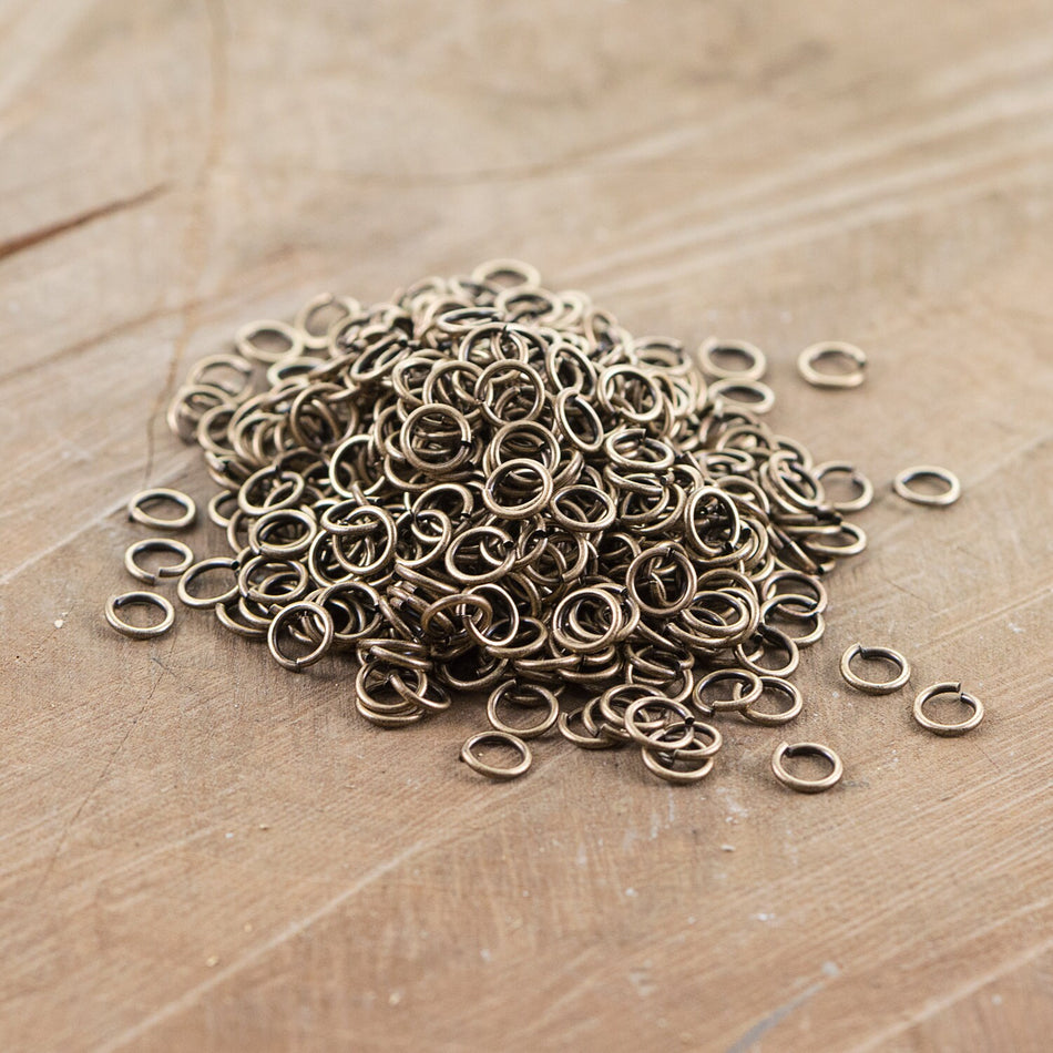 7mm OD Open Brass Ox Jump Rings 18 Gauge Made in the USA (100) fnd201B