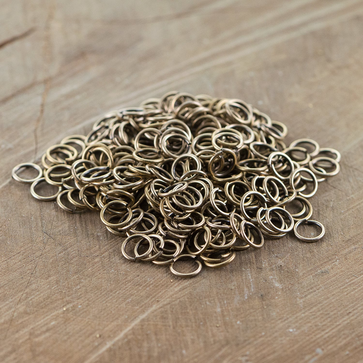 8mm OD Open Brass Ox Jump Rings 18 Gauge Made in the USA (100) fnd202B