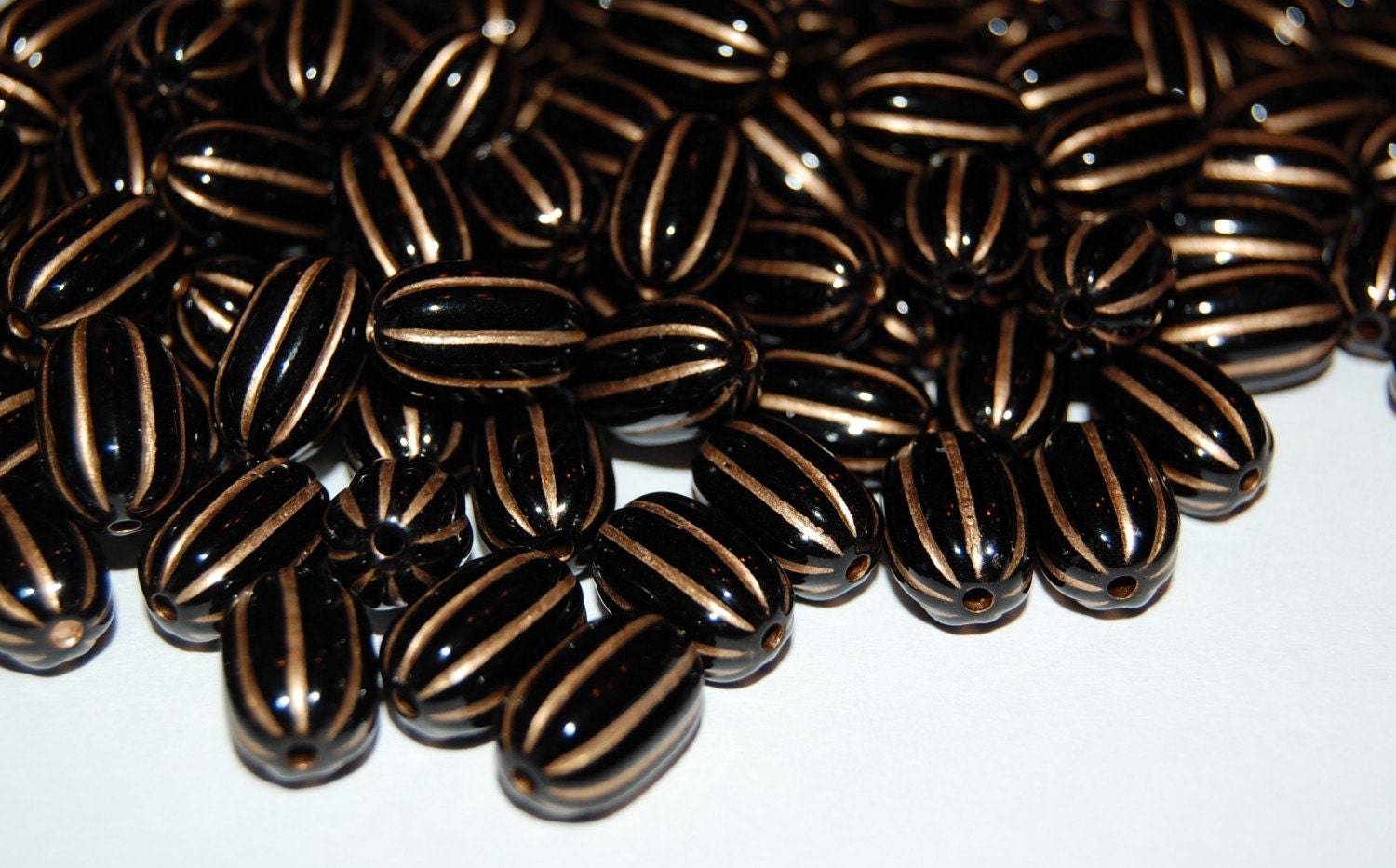 Acrylic Black and Gold Oval Ribbed Melon Beads bds465A