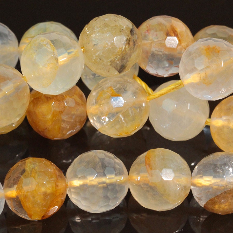 Dakota Stones Golden Blood Quartz 10mm Faceted Round Gemstones. 15-16" Strand. GBQ10RD-F