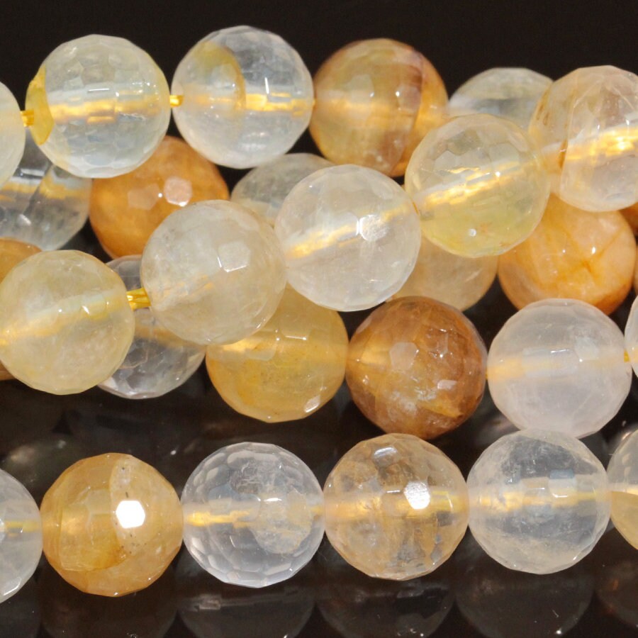 Dakota Stones Golden Blood Quartz 8mm Faceted Round Gemstones. 15-16" Strand. GBQ8RD-F