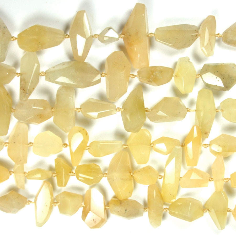 Dakota Stones Yellow Hematoid Mixed Beads Gemstones. 8" Strand. YHQ8-25SC-8
