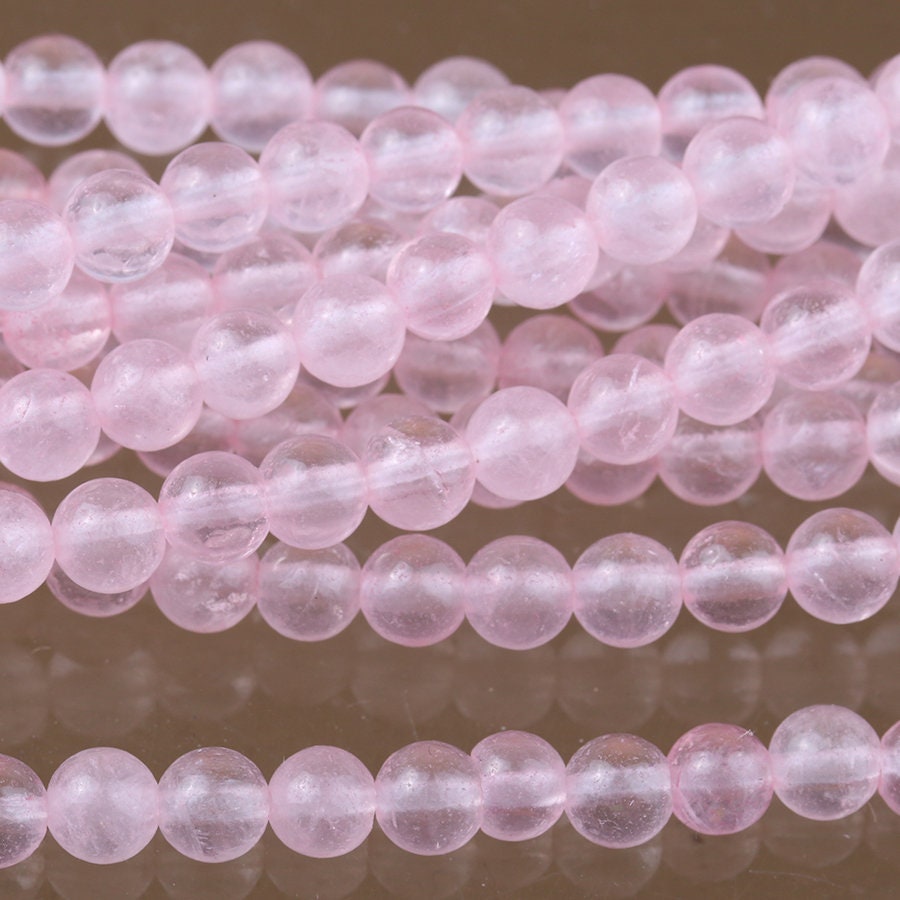 Dakota Stones Rose Quartz 4mm Round Bead Gemstones. RQZ4RD-8