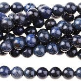 Dakota Stones Dumortierite 6mm Round Gemstones. 8" Strand. DMT6RD-8