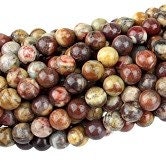 Dakota Stones Birdseye Rhyolite 8mm Round Gemstones. 8" Strand. BER8RD-8