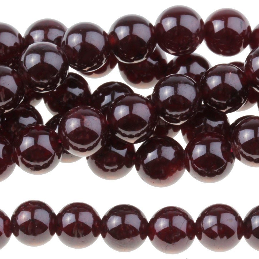 Dakota Stones Red Garnet 6mm Round Gemstones. 8" Strand. RGT6RD-8