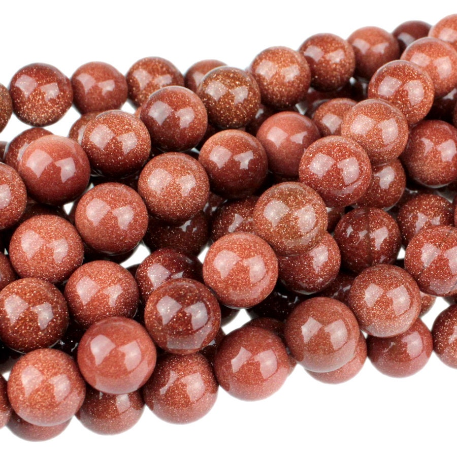 Dakota Stones Goldstone 8mm Round Gemstones. 8" Strand. GLD8RD-8