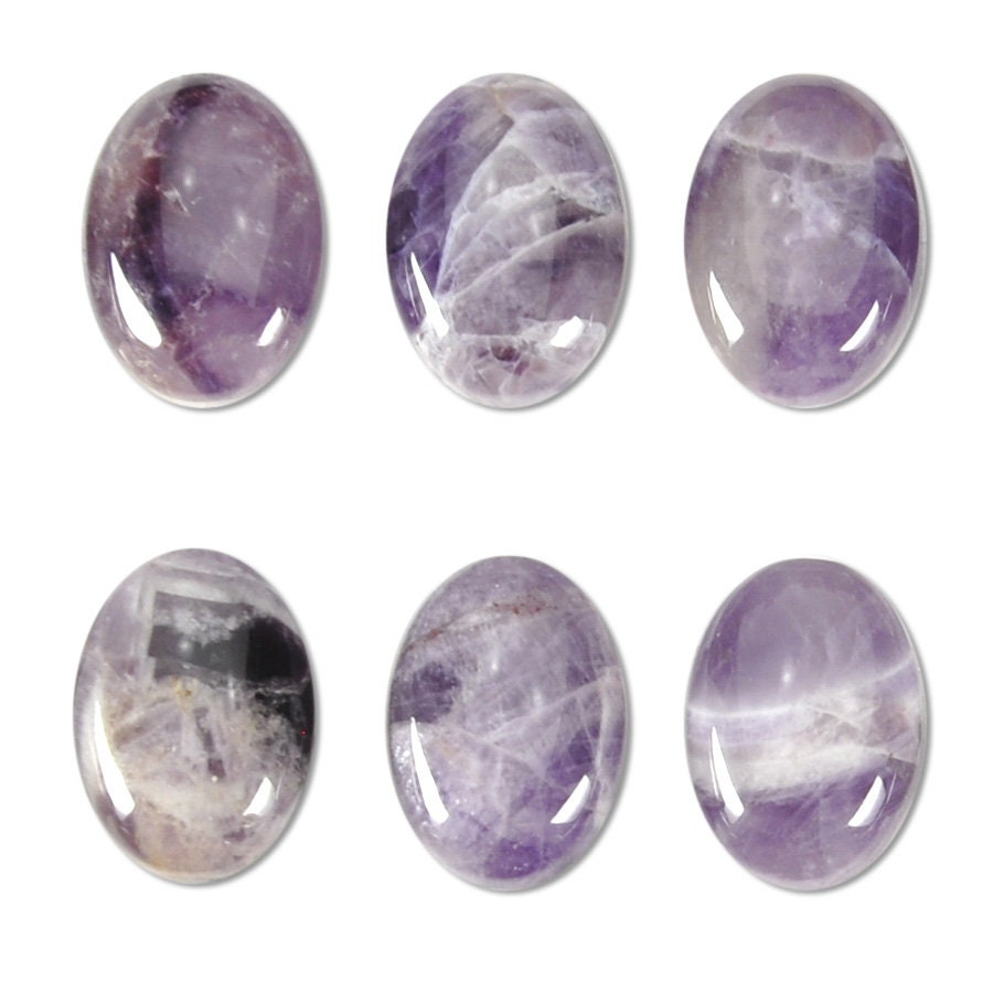 Dakota Stones Dog Teeth Amethyst 14x10mm Oval Cabochon Gemstones. CAB-DTA14x10OV
