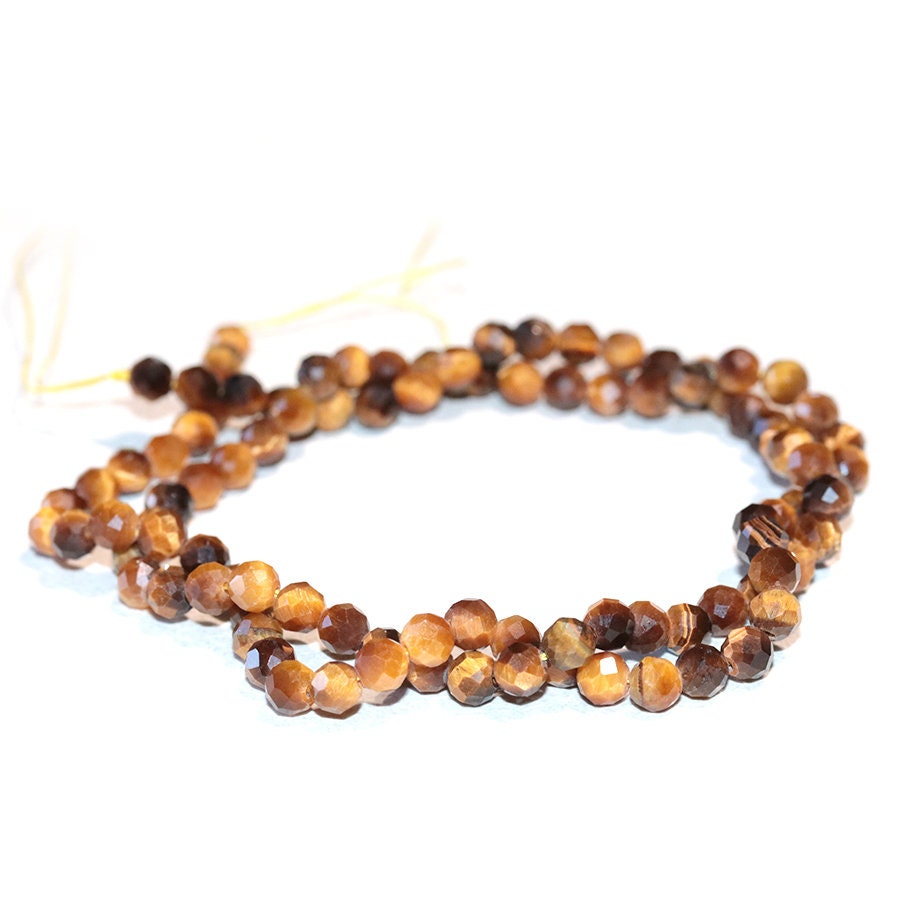 Dakota Stones Tiger Eye 4mm Diamond Cut Faceted Round Gemstones 16" Strand. TGE4RD-F-DC