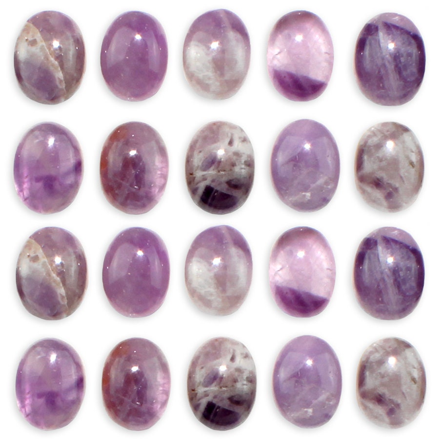Dakota Stones Dog Teeth Amethyst 8x6mm Cabochon Gemstones. CAB-DTA8x6OV