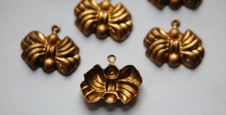 Raw Brass Puffy Bow Charm Drop chr003