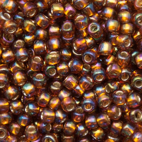 6/0 TOHO ROUND Silver Lined Rainbow Topaz Seed Bead (8g)