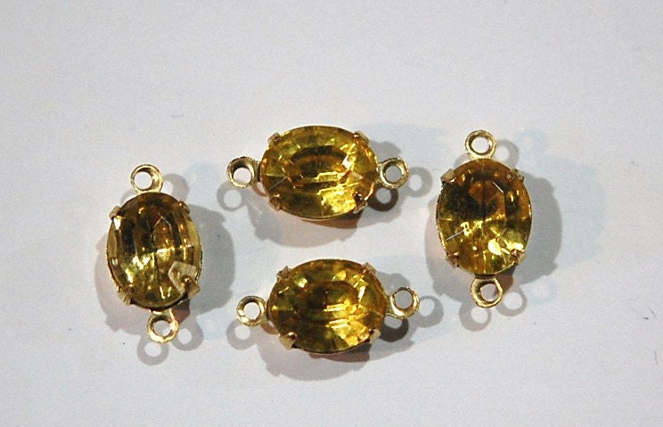Faceted Jonquil Oval Stones in 2 Loop Brass Setting ovl005BB2