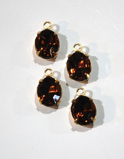 Faceted Topaz Oval Stones in 1 Loop Brass Setting ovl005AA