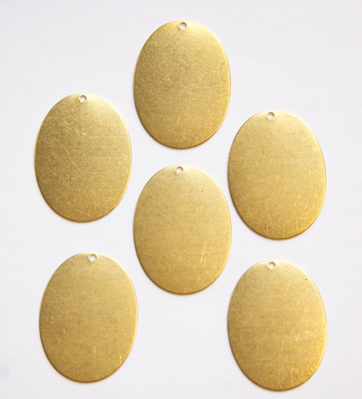 1 Hole Flat Oval 31.5x24mm (4)