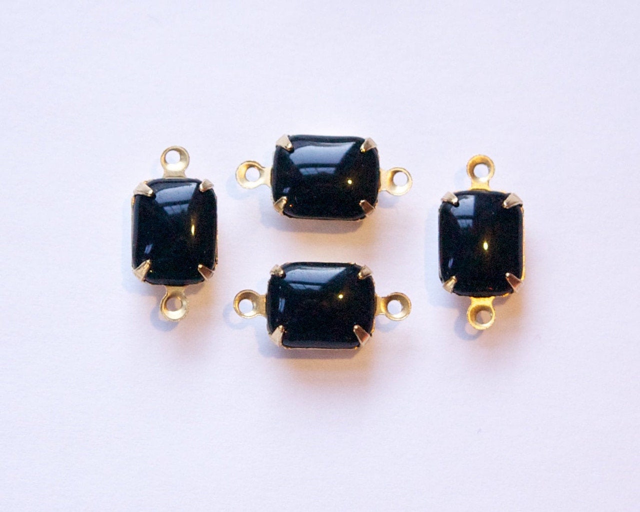 Smooth Black Stones in 2 Loop Brass Setting 10x8mm (4)