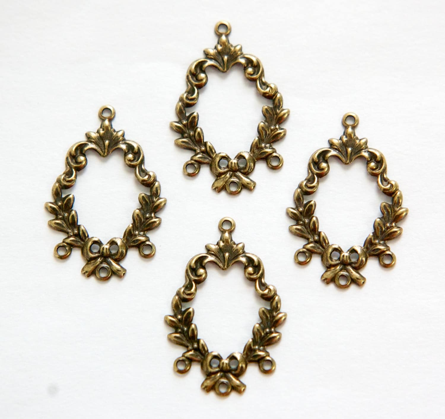 4 Loop Brass Ox Leaves and Bow Stamping Pendants (4) pnd078B