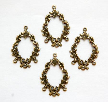 4 Loop Brass Ox Leaves and Bow Stamping Pendants (4) pnd078B