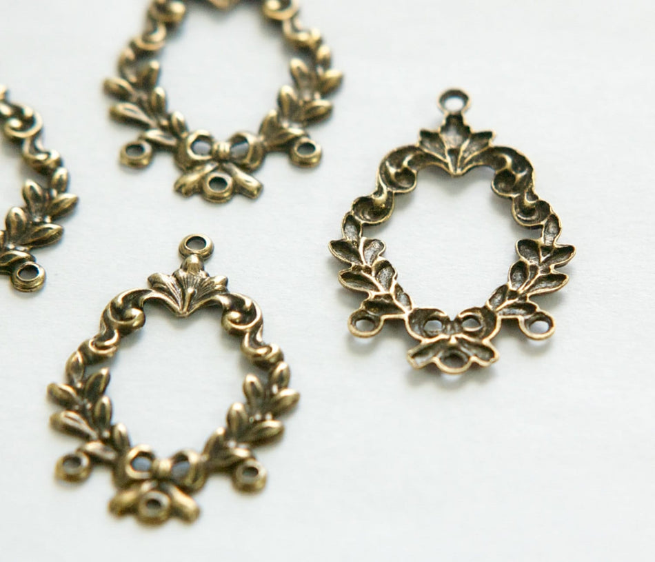 4 Loop Brass Ox Leaves and Bow Stamping Pendants (4) pnd078B