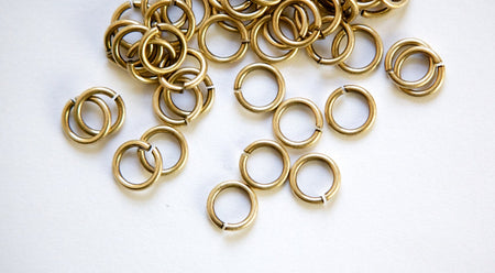 7mm OD Open Brass Ox Jump Rings 18 Gauge Made in the USA (100) fnd201B