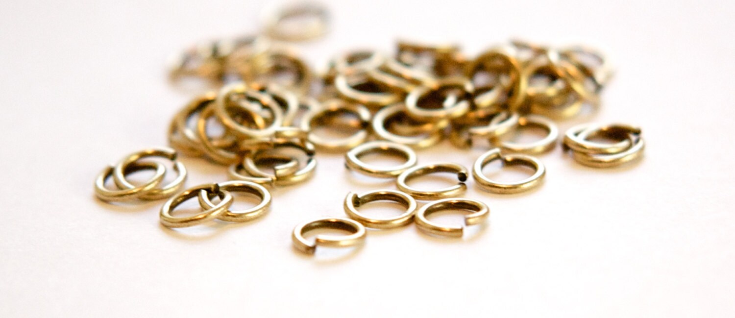 7mm OD Open Brass Ox Jump Rings 18 Gauge Made in the USA (100) fnd201B