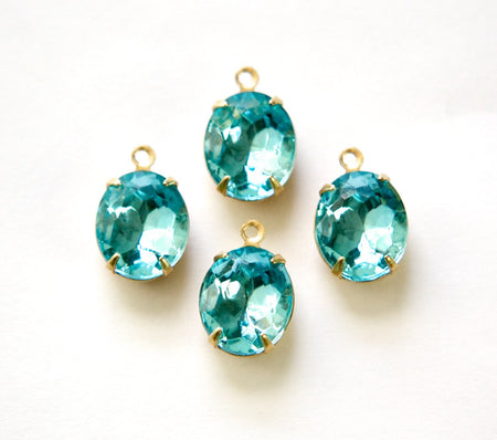 Aqua Blue Faceted Oval Stones in 1 Loop Brass Setting 12mmx10mm (4) ovl011L