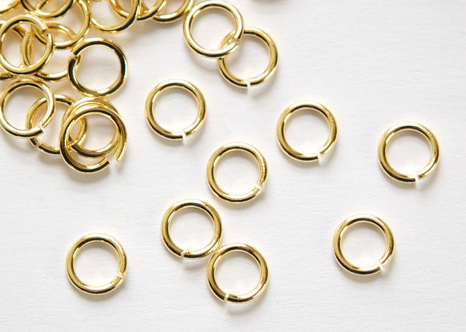 7mm OD Open Gold Plated Jump Rings 18 Gauge Made in the USA (100) fnd201D