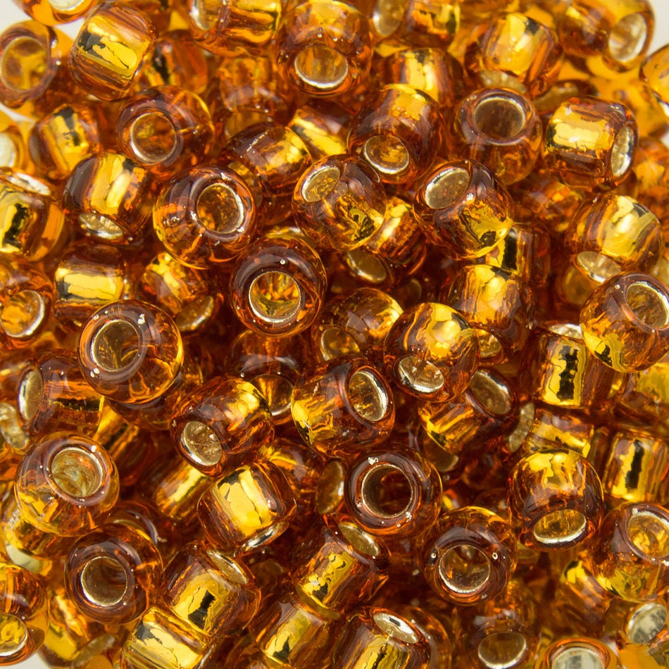 8/0 TOHO ROUND Silver Lined Topaz Seed Bead (8g)