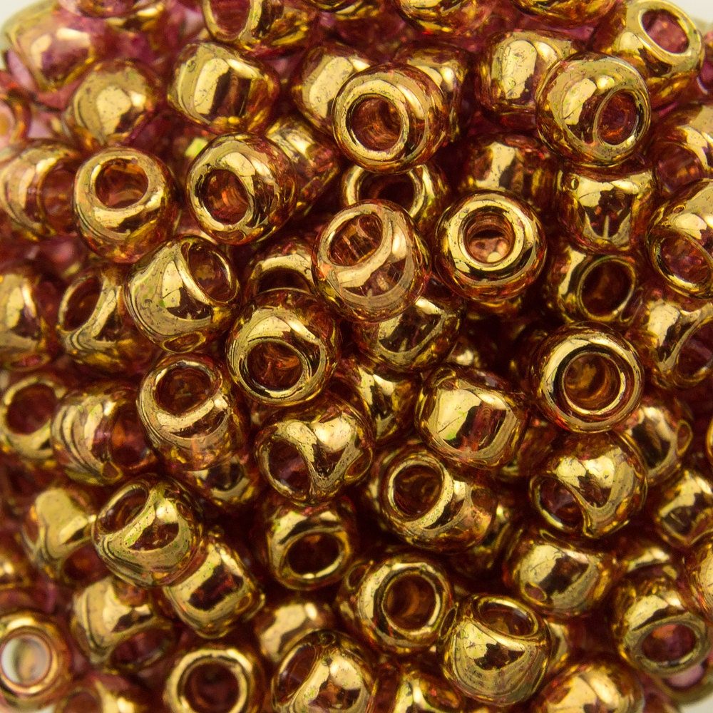8/0 TOHO ROUND Gold Lustered Transparent Pink Seed Bead (8g)