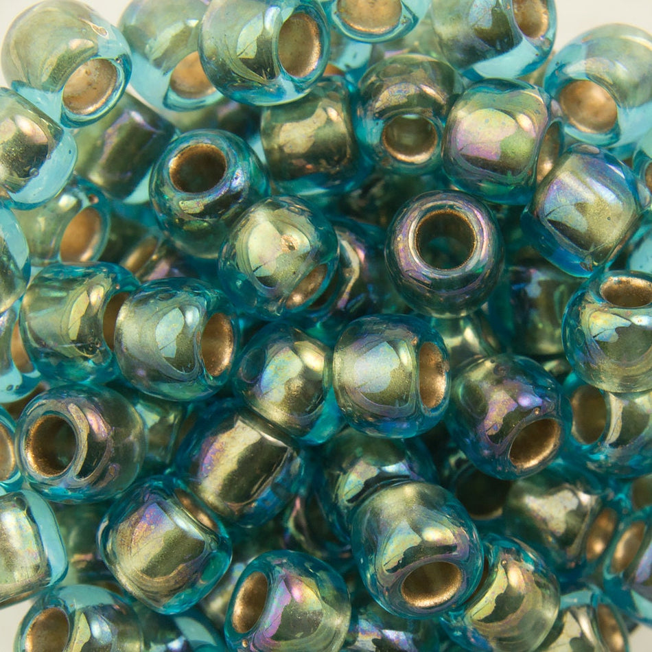 6/0 TOHO ROUND Gold Lined Rainbow Aqua Seed Bead (8g)