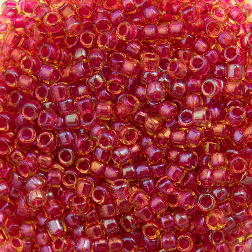 15/0 TOHO ROUND Inside Color Rainbow Light Topaz / Mauve Lined Seed Bead (8g)