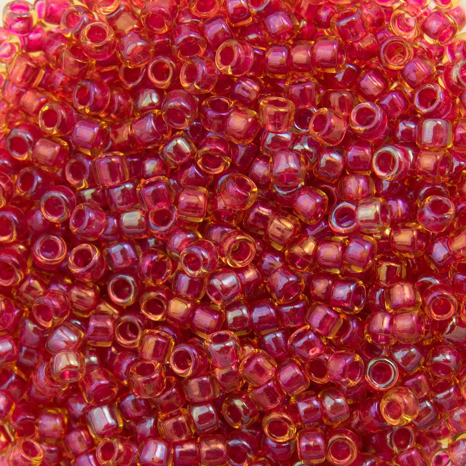 15/0 TOHO ROUND Inside Color Rainbow Light Topaz / Mauve Lined Seed Bead (8g)