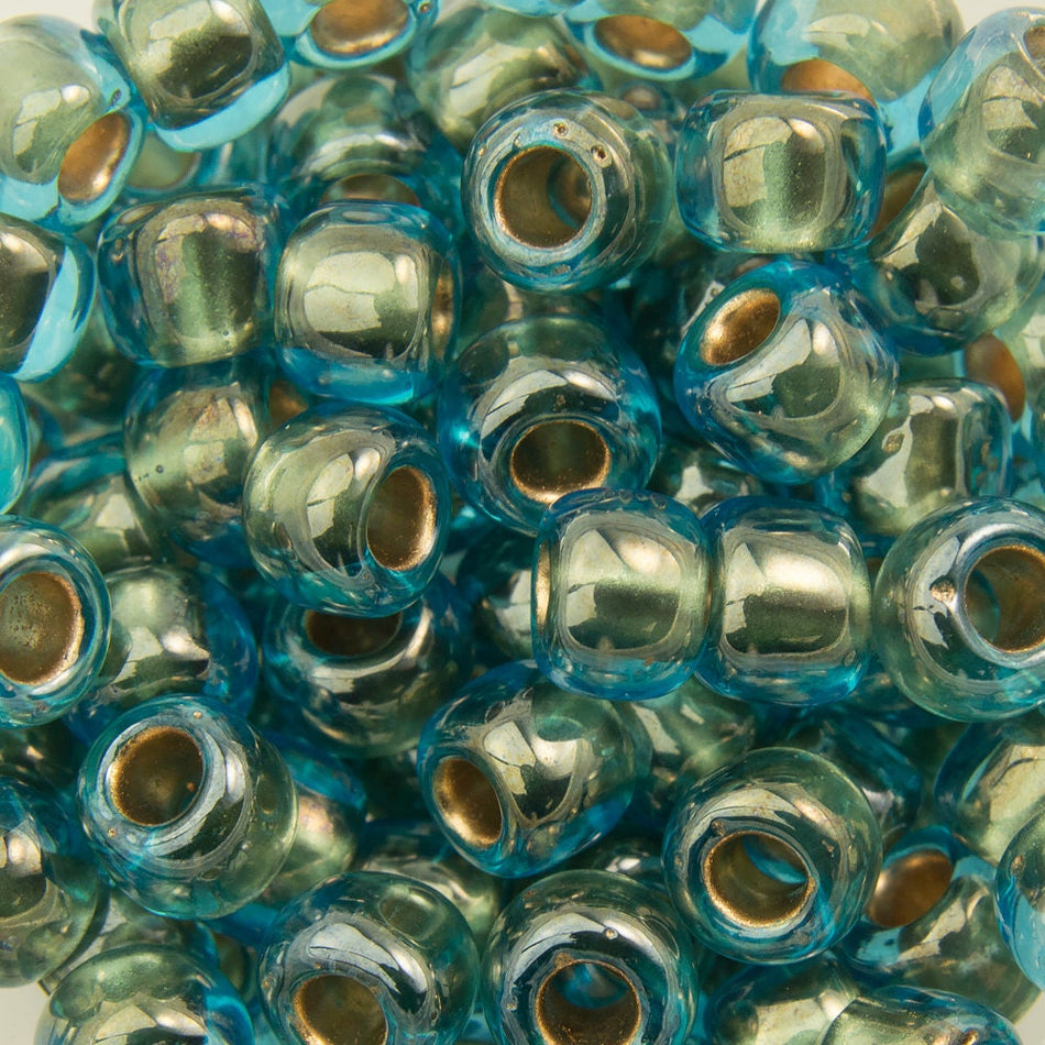 6/0 TOHO ROUND Gold Lined Aqua Seed Bead (8g)