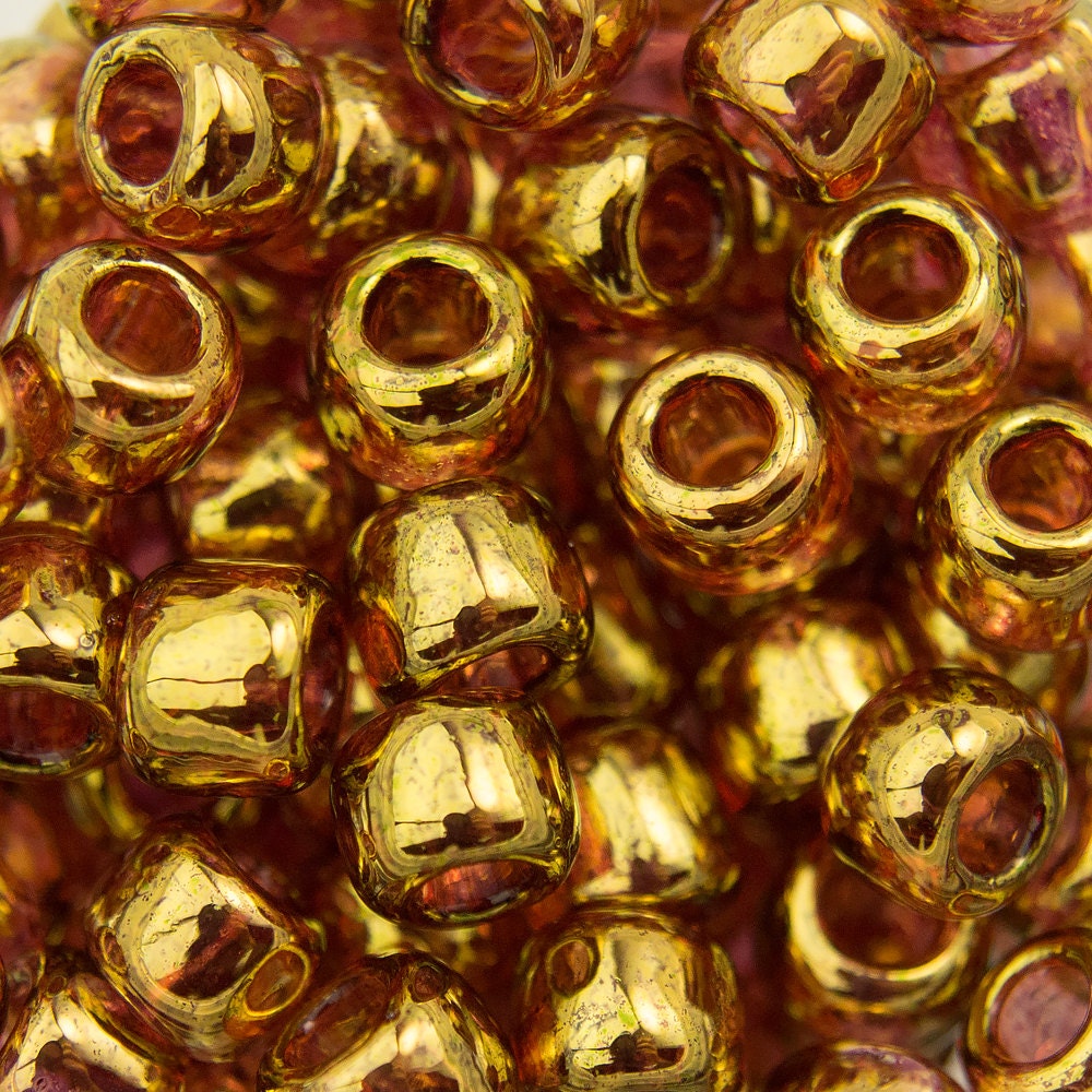 6/0 TOHO ROUND Gold Lustered Transparent Pink Seed Bead (8g)