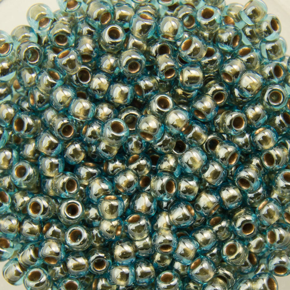 11/0 TOHO ROUND Gold Lined Aqua Seed Bead (8g)