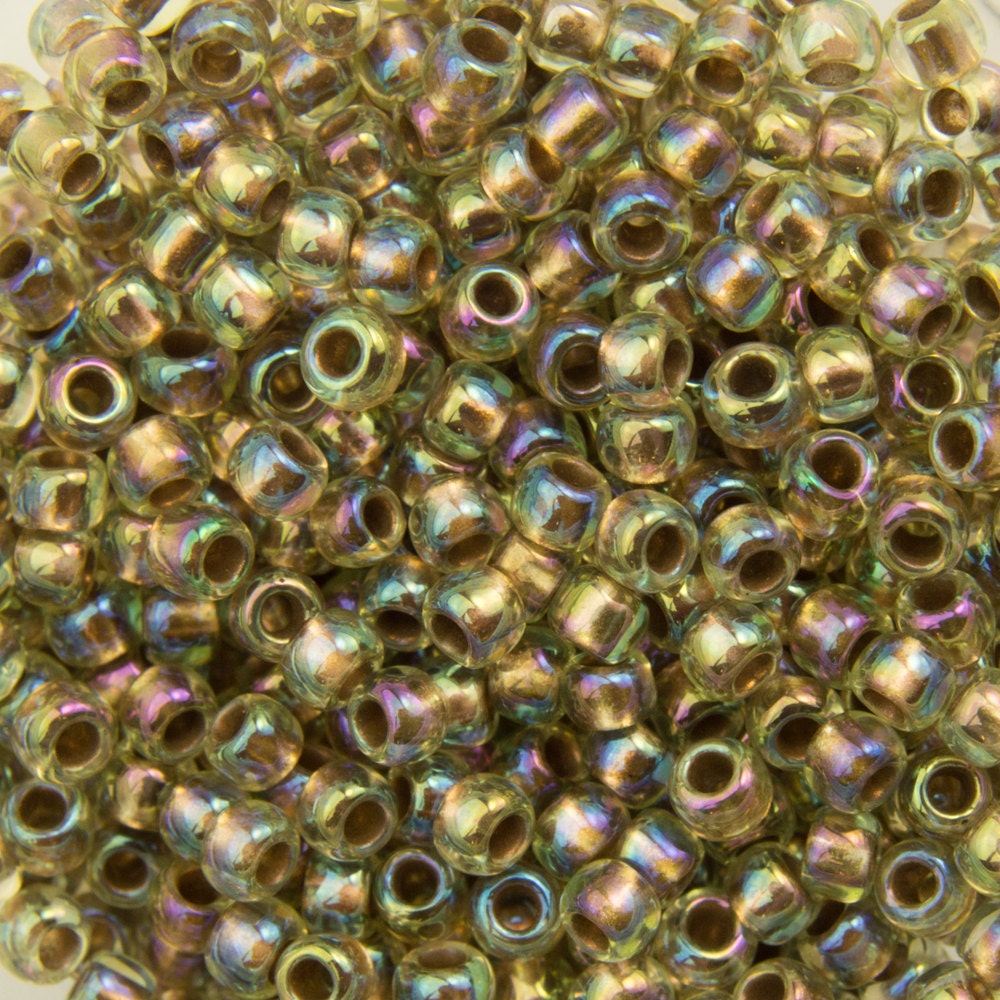 11/0 TOHO ROUND Gold Lined Rainbow Light Jonquil Seed Bead (8g)