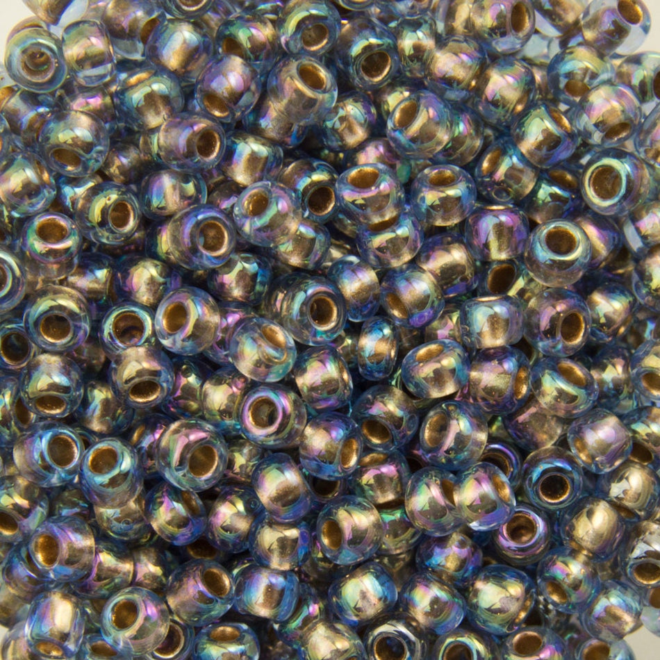 11/0 TOHO ROUND Gold Lined Rainbow Light Sapphire Seed Bead (8g)