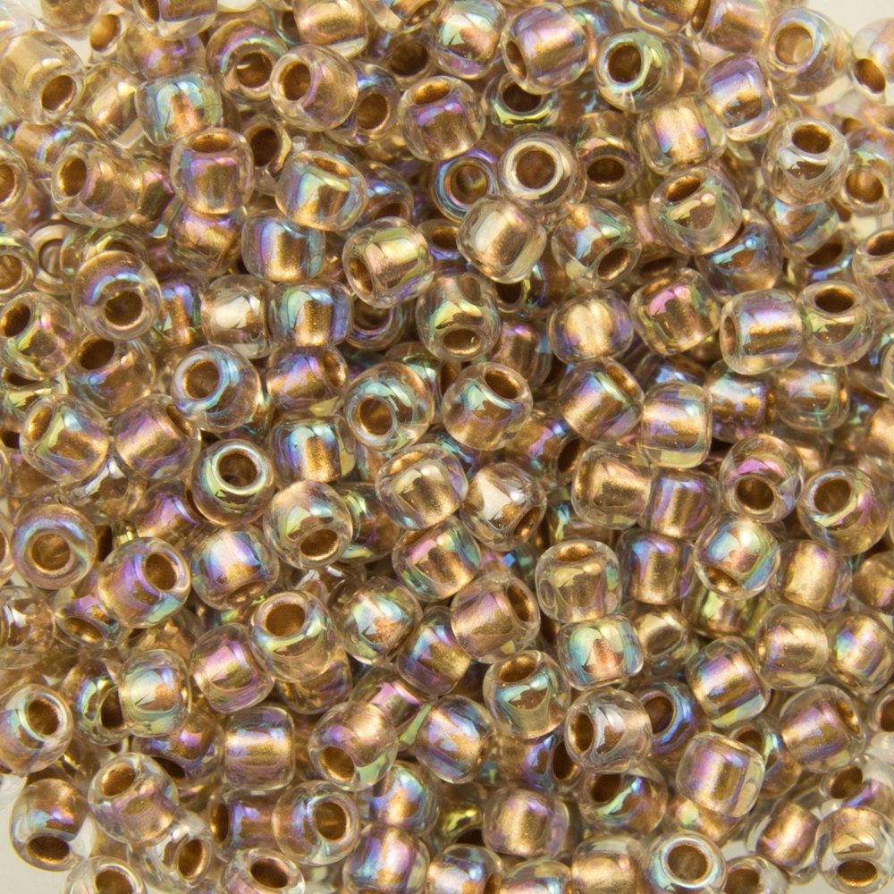 11/0 TOHO ROUND Gold Lined Rainbow Crystal Seed Bead (8g)