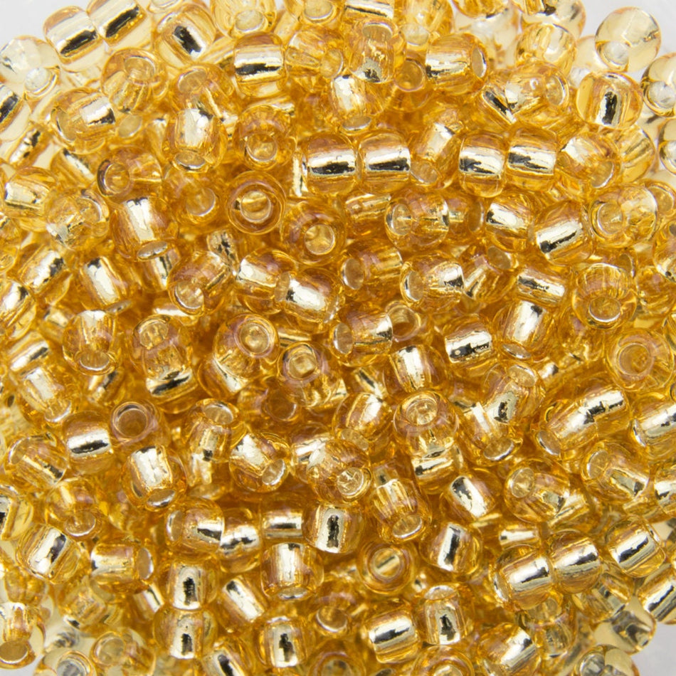 11/0 TOHO ROUND Silver Lined Light Topaz Seed Bead (8g)