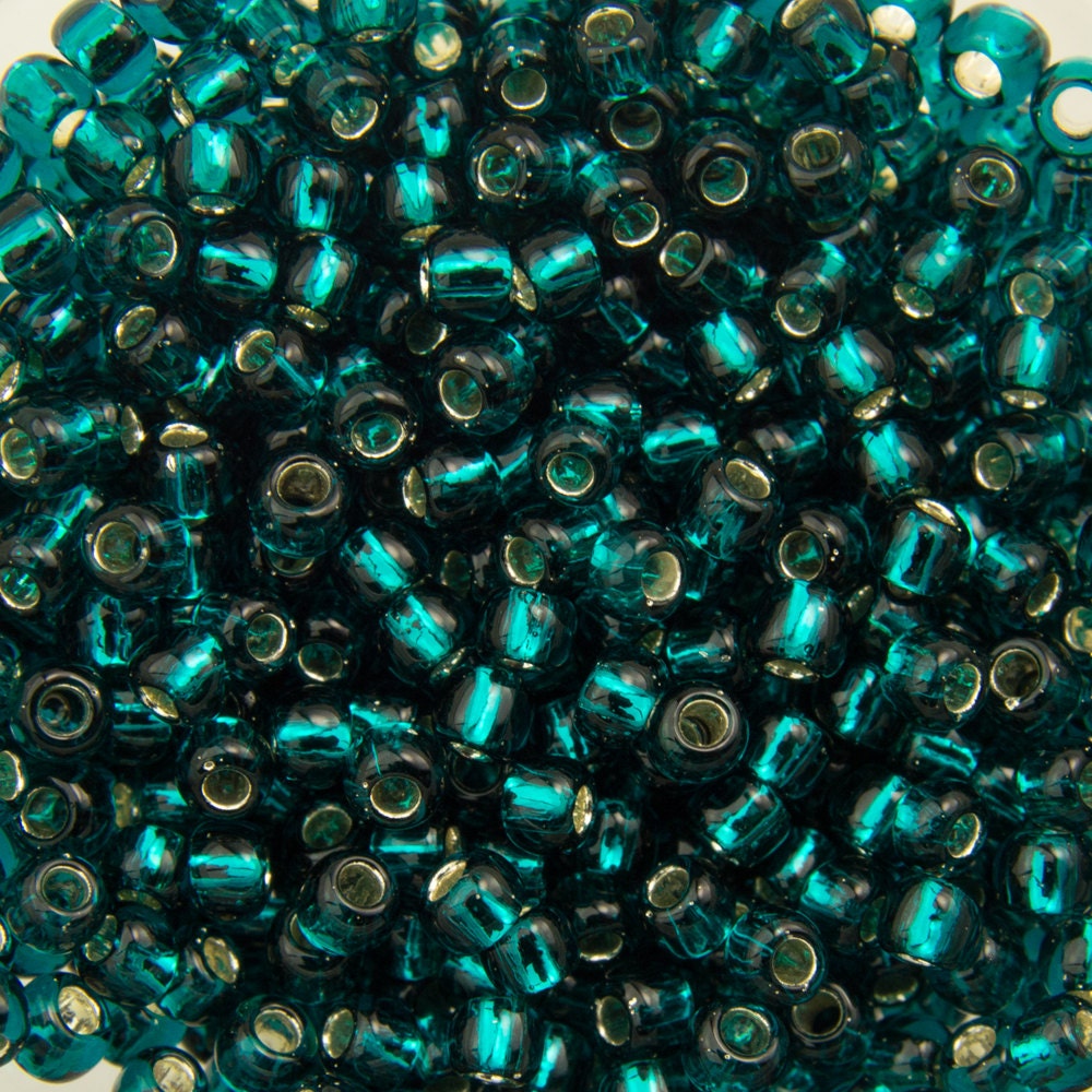 11/0 TOHO ROUND Silver Lined Teal Seed Bead (8g)