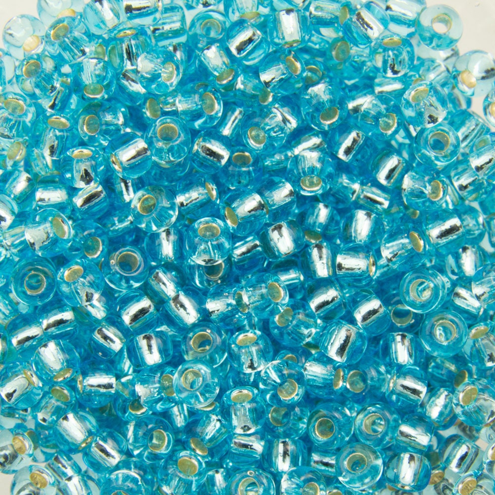 11/0 TOHO ROUND Silver Lined Aquamarine Seed Bead (8g)