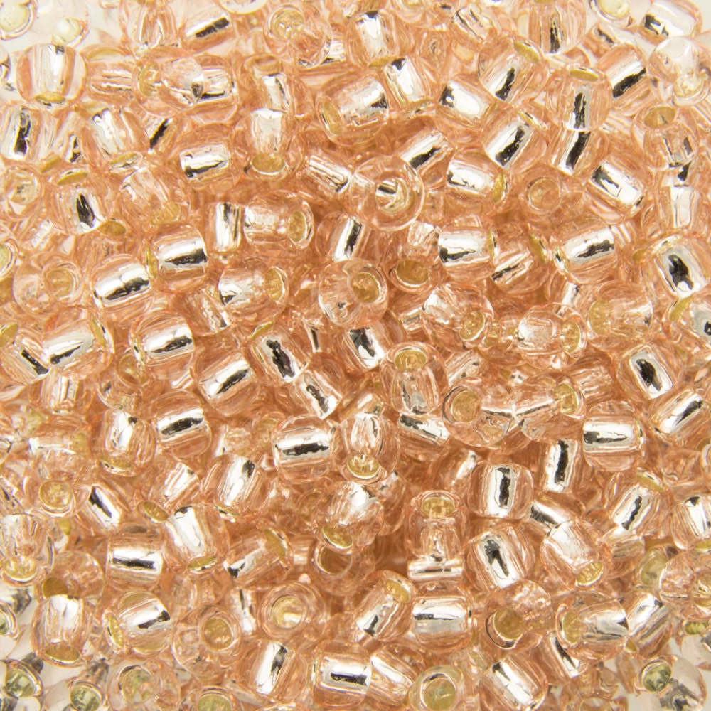 11/0 TOHO ROUND Silver Lined Rosaline Seed Bead (8g)