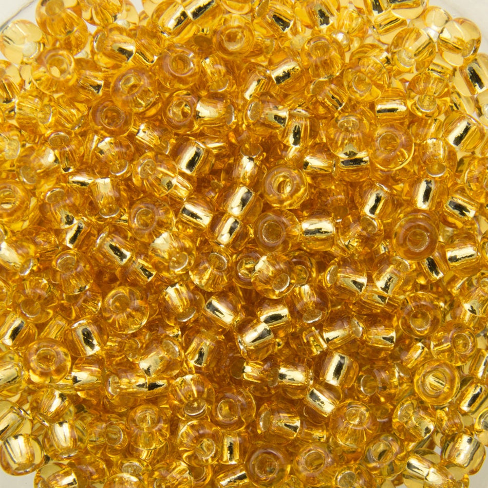 11/0 TOHO ROUND Silver Lined Medium Topaz Seed Bead (8g)