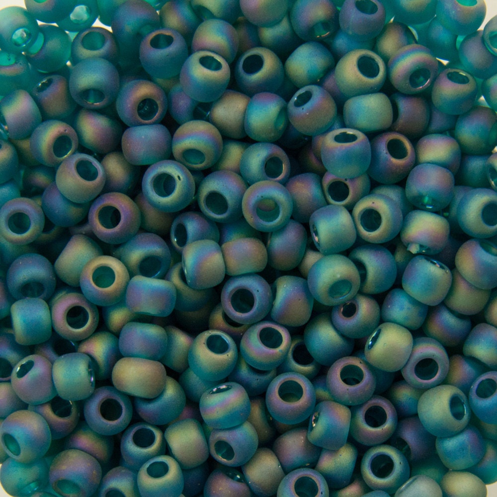 11/0 TOHO ROUND Transparent Rainbow Frosted Teal Seed Bead (8g)