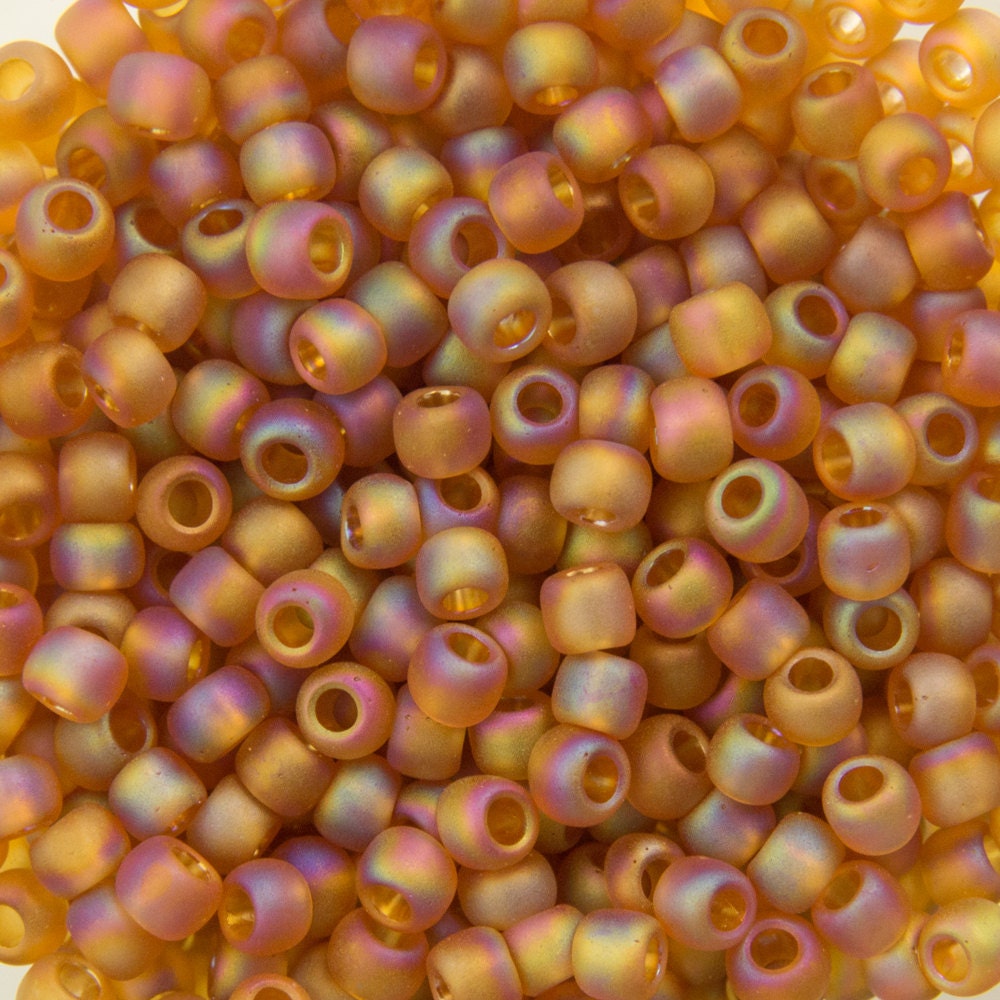 11/0 TOHO ROUND Transparent Rainbow Frosted Dark Topaz Seed Bead (8g)