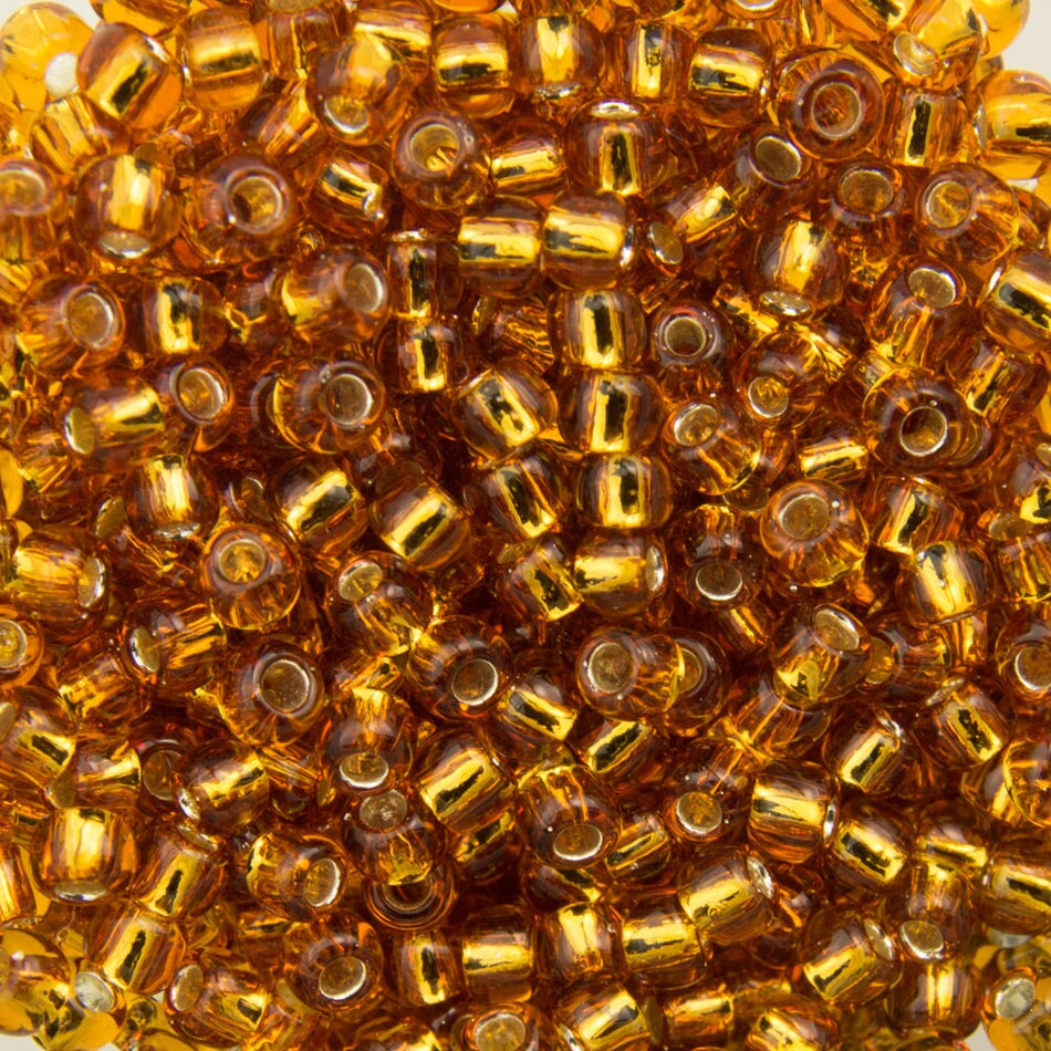 11/0 TOHO ROUND Silver Lined Topaz Seed Bead (8g)