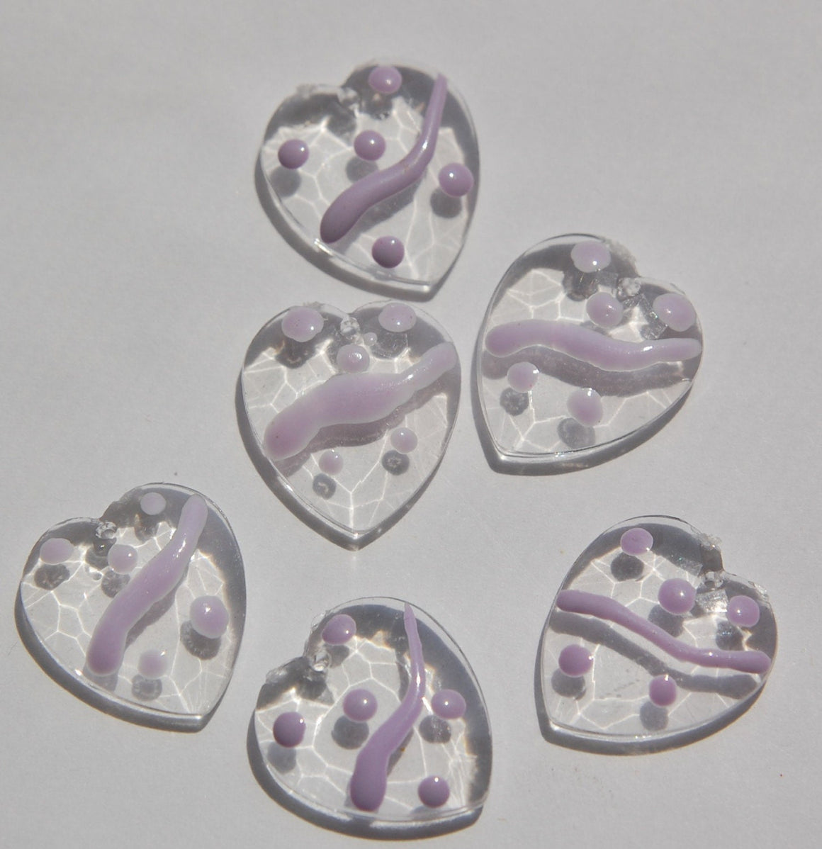 Clear Faceted Hearts with Purple Accents Charms chr094