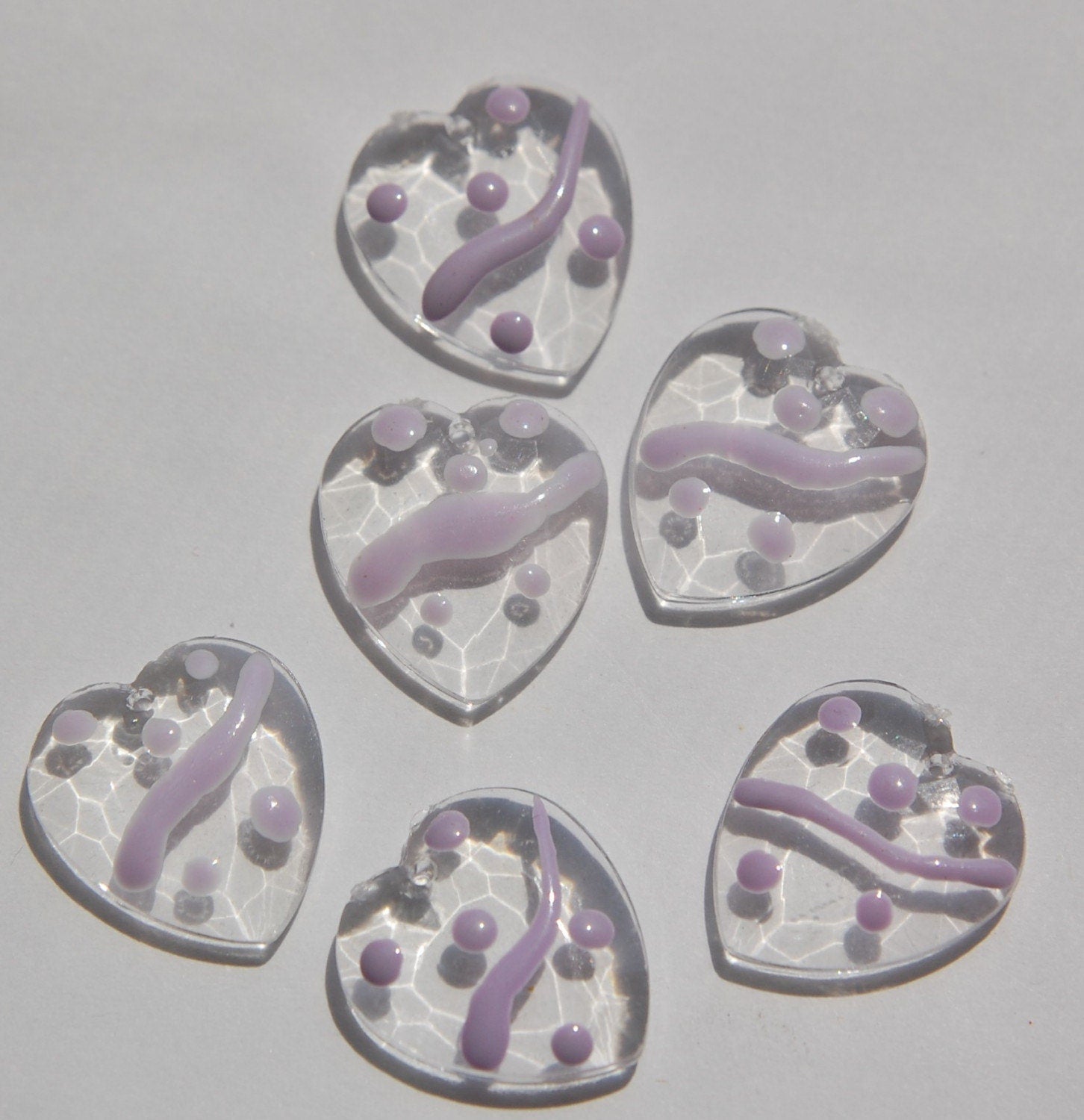 Clear Faceted Hearts with Purple Accents Charms chr094