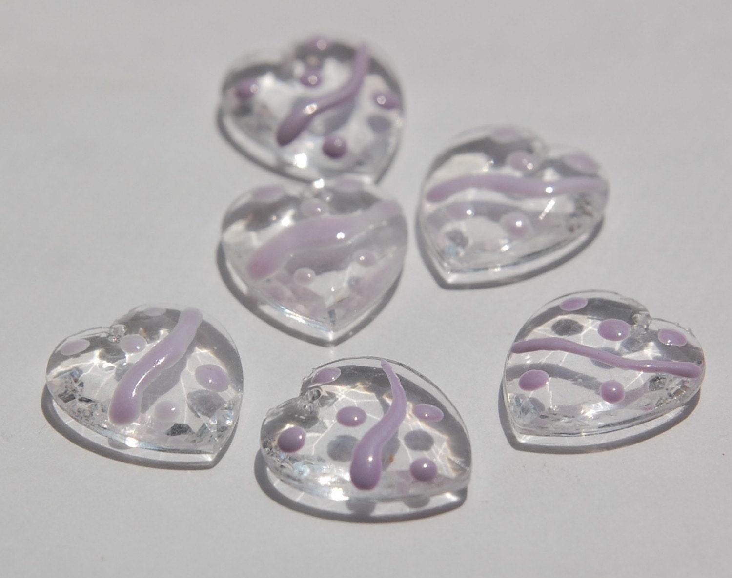 Clear Faceted Hearts with Purple Accents Charms chr094