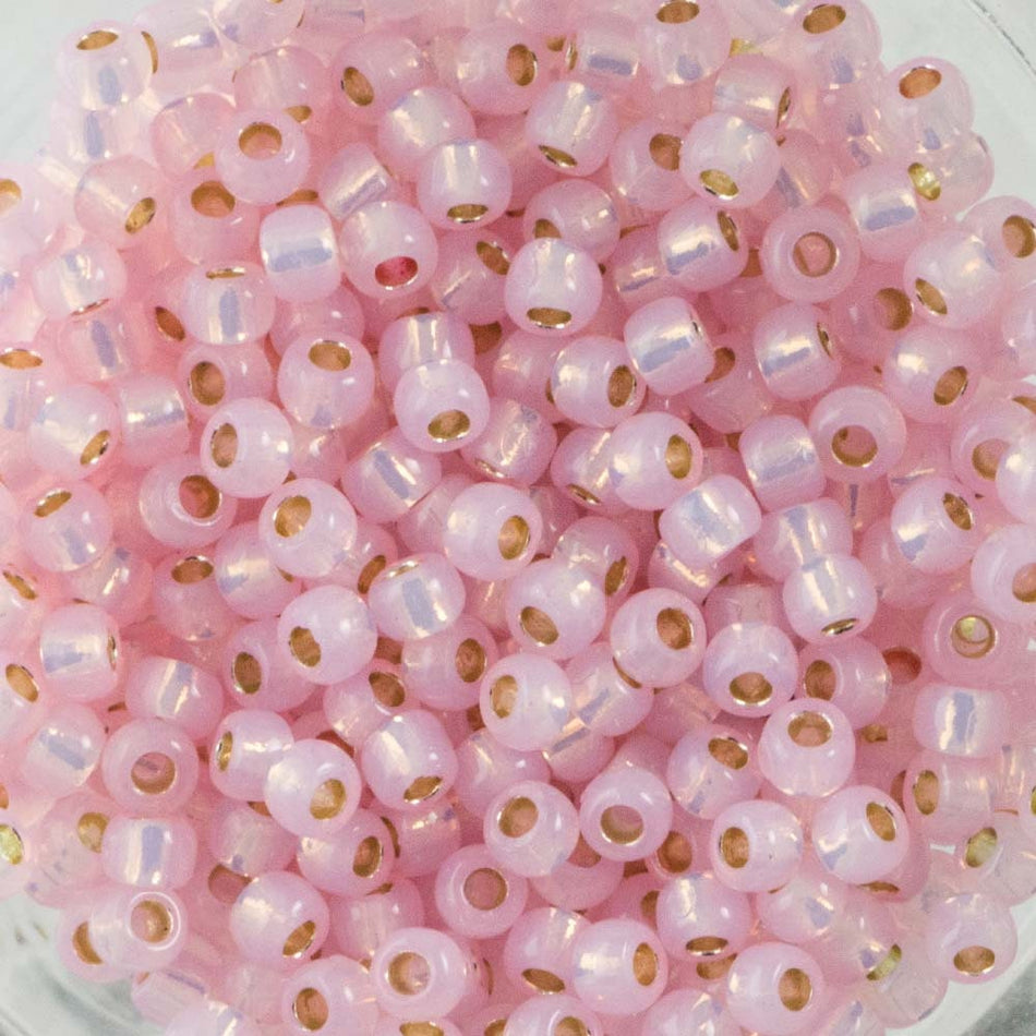 11/0 TOHO ROUND PermaFinish Silver Lined Milky Soft Pink Seed Bead (8g)